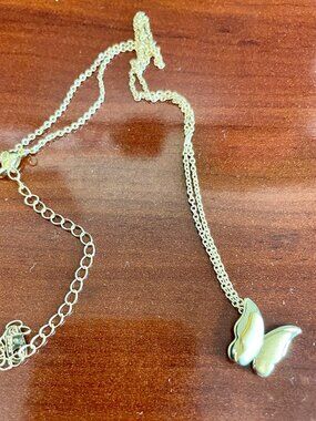 Gold butterfly pendant necklace, short.